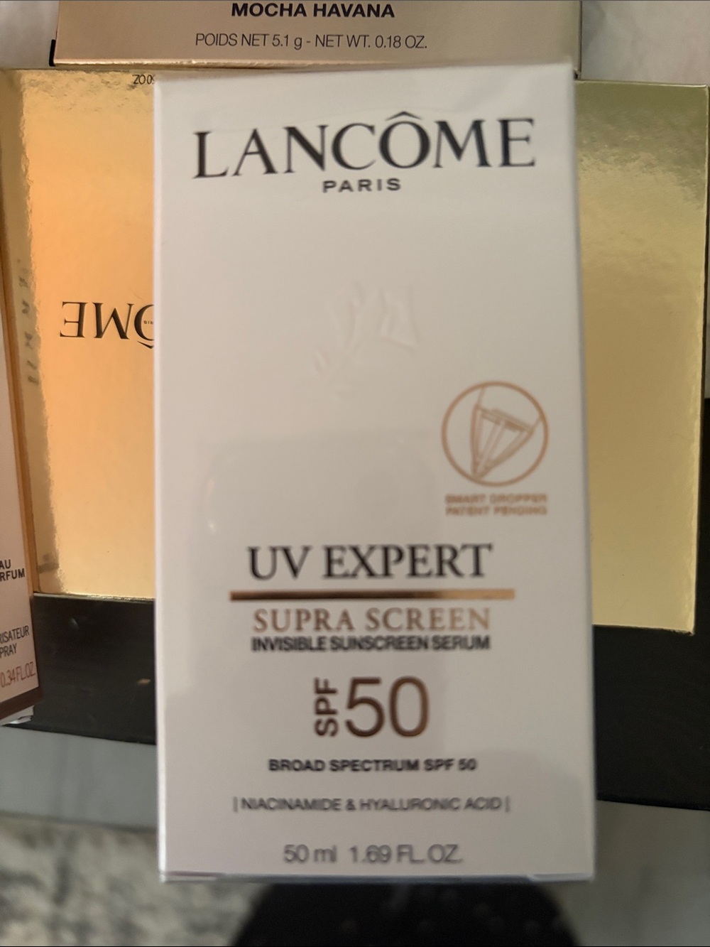 Lancôme UV Expert Supra Screen Invisible Sunscreen Serum — White & Gold Accents